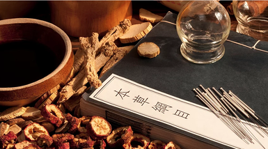 Picture of acupuncture needles and chinese herbs